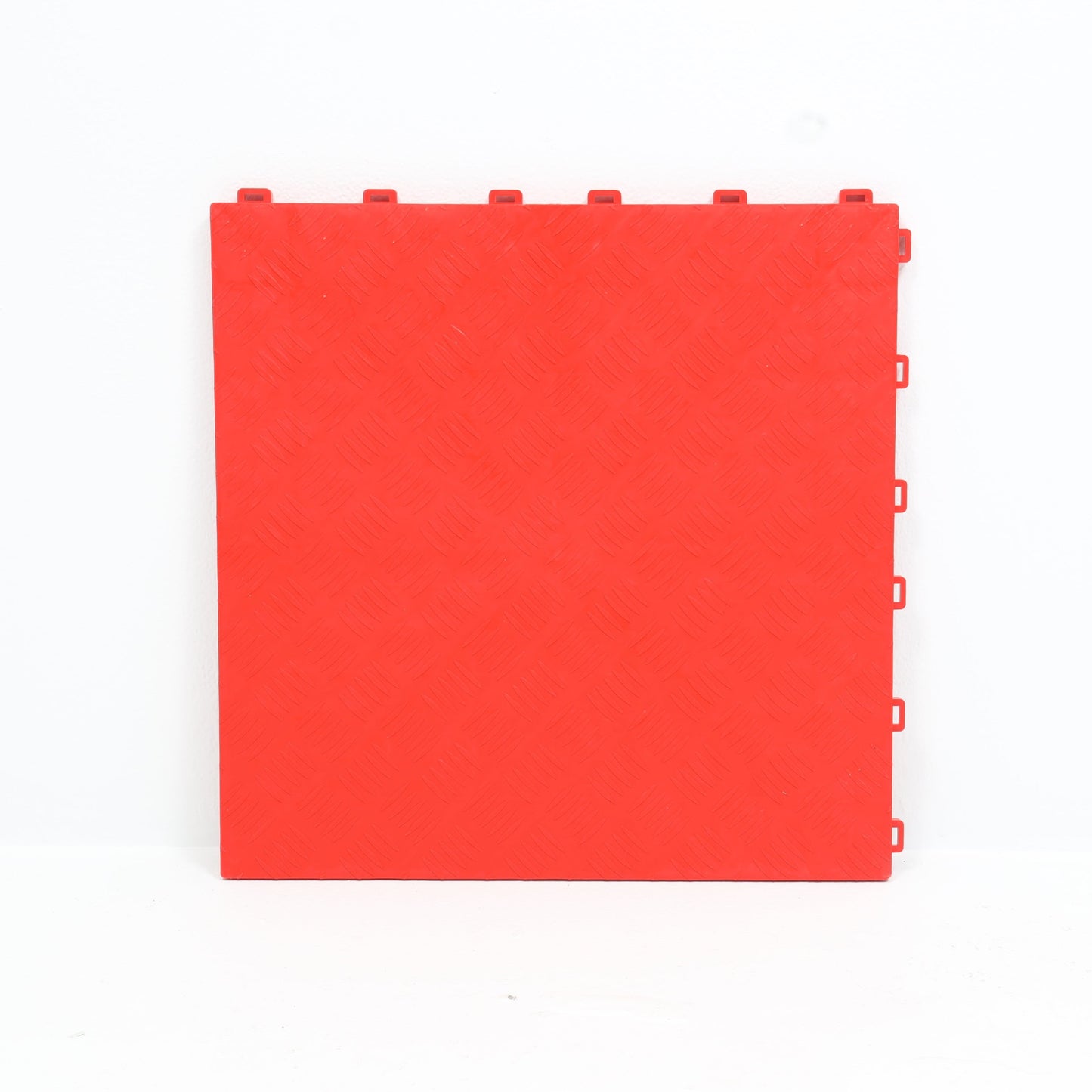 Flat-surfaced Tile