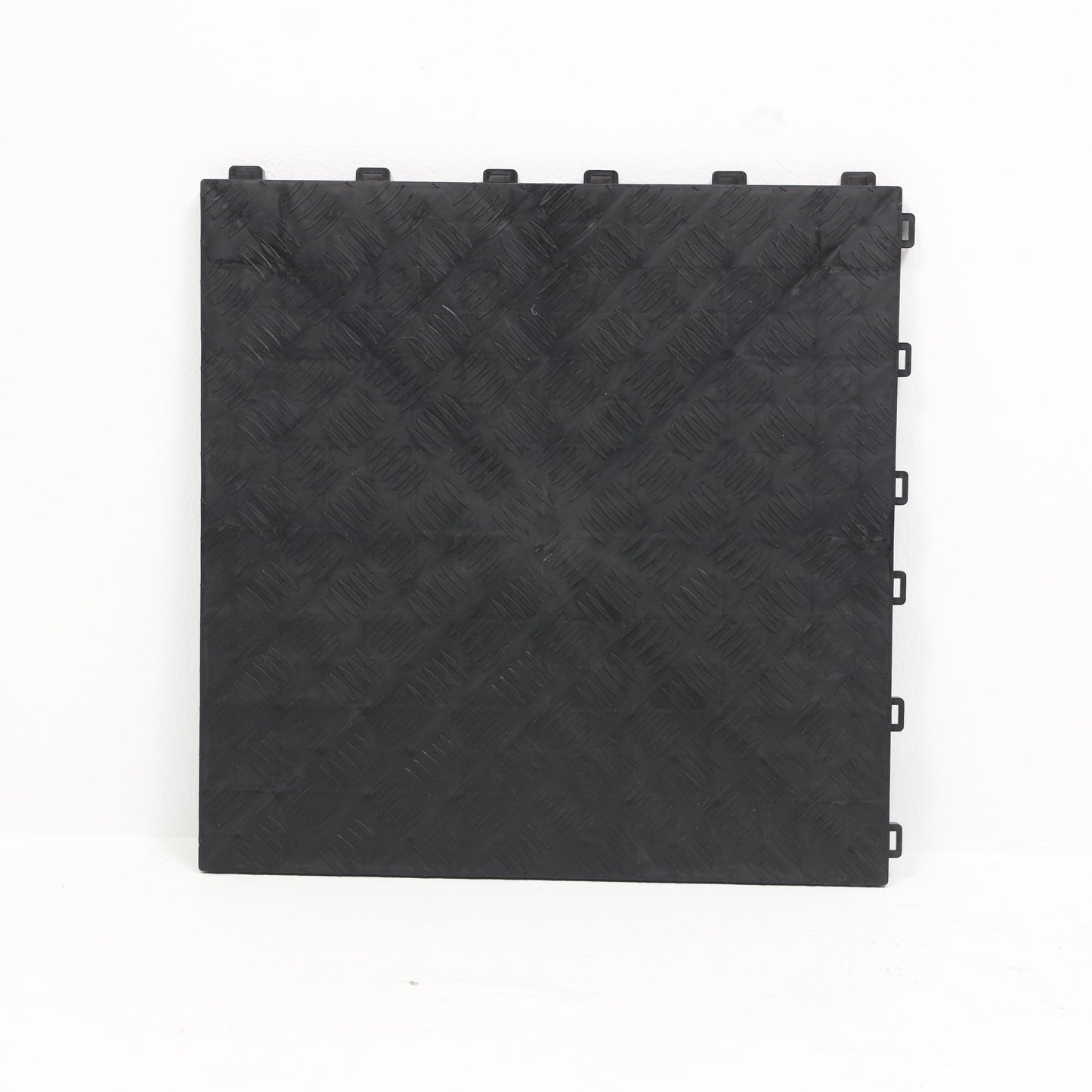 Flat-surfaced Tile